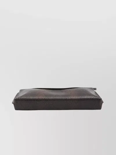 Jacquemus Ovalo Clutch In Brown
