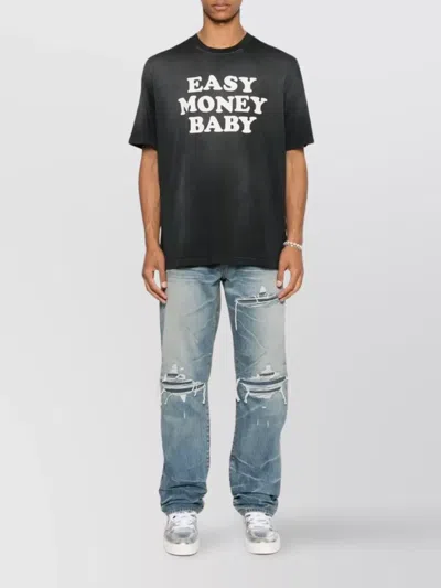 Amiri Men Blue Jeans With Ripped Details On The Front And Logo Patch On The Rear In Denim Man In Blue