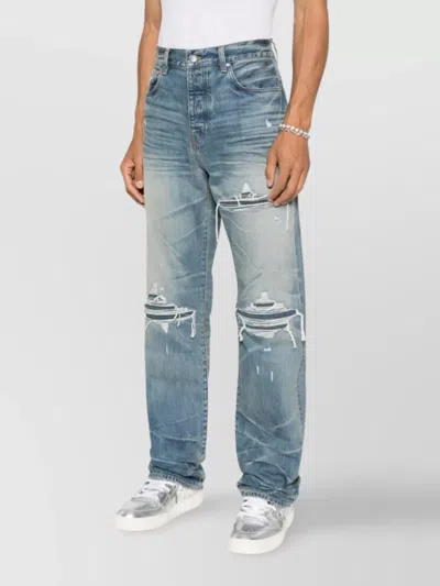 Amiri Men Blue Jeans With Ripped Details On The Front And Logo Patch On The Rear In Denim Man In Blue