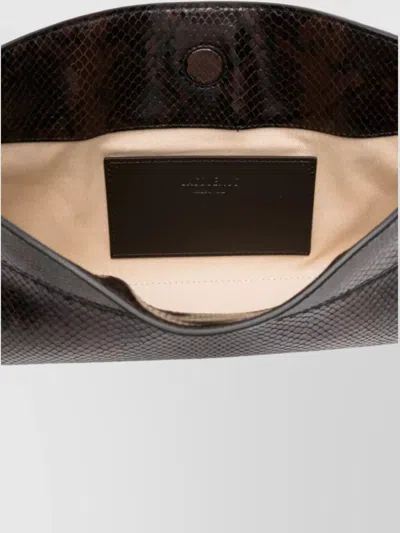 Jacquemus Ovalo Clutch In Brown