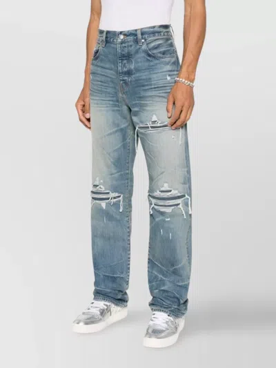 Amiri Men Blue Jeans With Ripped Details On The Front And Logo Patch On The Rear In Denim Man In Blue
