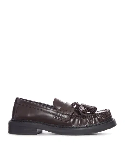 Miu Miu Tassel Loafers In Polished Leather In Brown