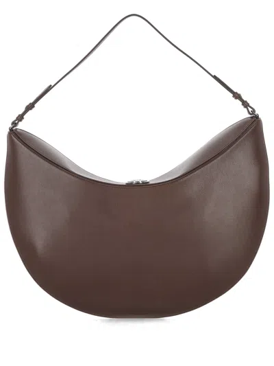 Jacquemus Le Calisso Rond Large Brown Shoulder Bag With Adjustable Strap And Embossed Logo In Leathe In Brown