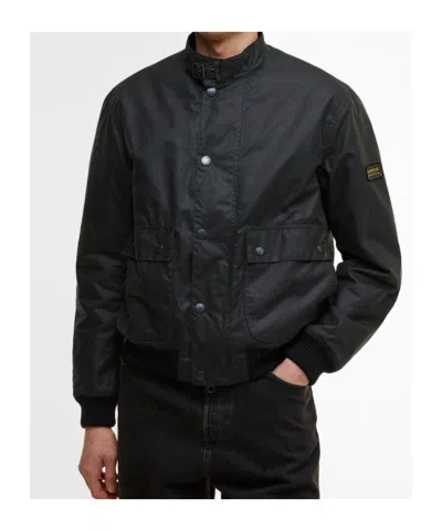 Barbour Traction Waxed Jacket In Green