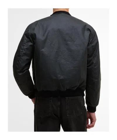 Barbour Traction Waxed Jacket In Green