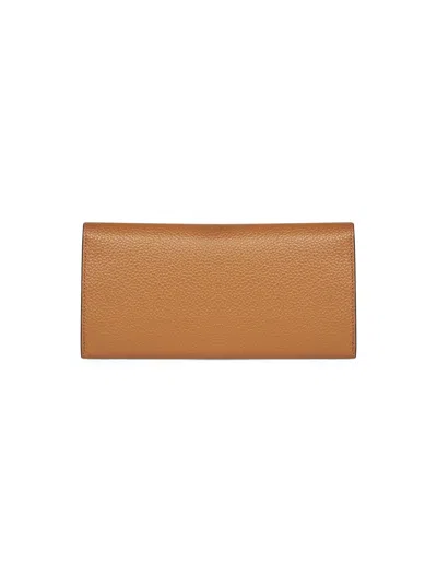Totême Toteme T-lock Leather Continental Wallet In Brown