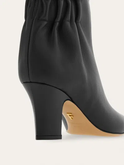Ferragamo Knee-high Boots With Curled Design And Block Heel In Black