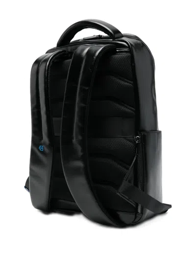 皮质顶置手柄双肩包