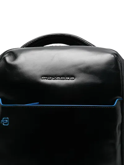 皮质顶置手柄双肩包