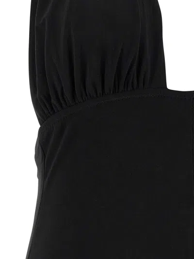 Norma Kamali Cross Halter Wide Leg Jumpsuit In Black