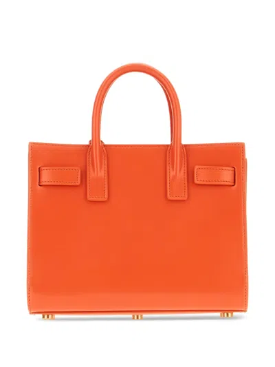Saint Laurent Sac De Jour Nano Top-handle Bag In Smooth Leather In Orange