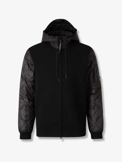 C.p. Company Men Black Jacket With Drawstring Hood And Logo Plaque On The Sleeve In Wool Man In Black
