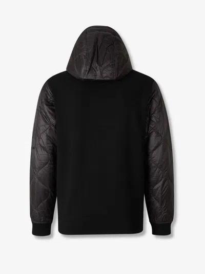 C.p. Company Men Black Jacket With Drawstring Hood And Logo Plaque On The Sleeve In Wool Man In Black