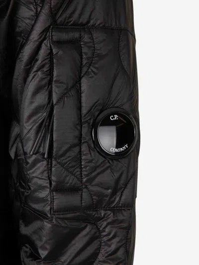 C.p. Company Men Black Jacket With Drawstring Hood And Logo Plaque On The Sleeve In Wool Man In Black