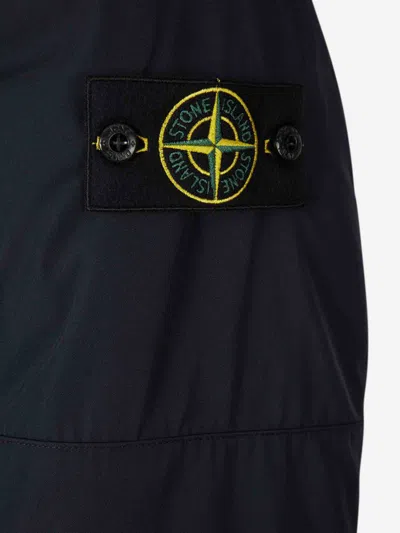 Stone Island Long Insulated Padded Jacket With High Collar And Hood In Blue