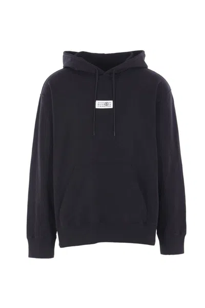 Mm6 Maison Margiela Mm6 By Maison Margiela Emblazoned Black Hoodie With Drawstring And Ribbed Finishes In Blue