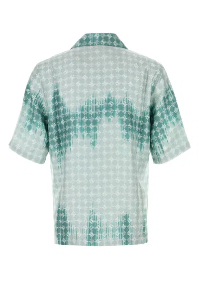 Amiri Geometric Pattern Short Sleeve Satin Top In Blue