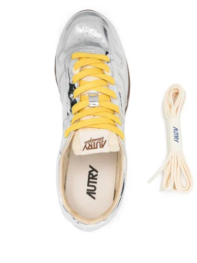 Autry Front Lace Sneakers In Bright Yellow And Shiny Silver In Silver