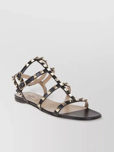 Valentino Garavani Rockstud Flat Calfskin Sandal With Straps Woman Black 40 In Black