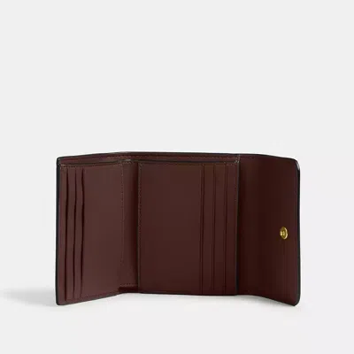 Coach Mila Small Flap Wallet In Signature Canvas In Brown