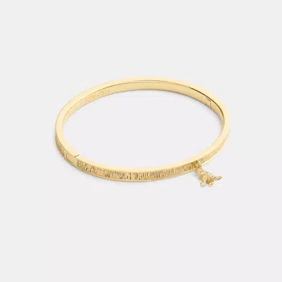 Coach Brushed Rexy Charm Hinged Bangle In Gold