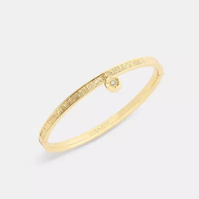 Coach Brushed Rexy Charm Hinged Bangle In Yellow