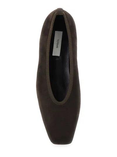 Totême Minimalist Suede Pointed-toe Flats In Black