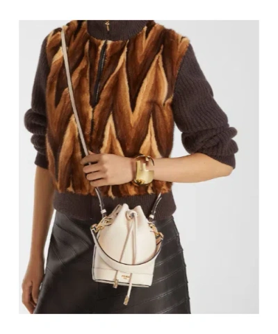 Fendi Women Ivory Leather Mon Tresor Bucket Bag In Brown