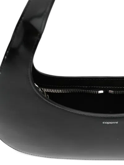 Coperni Curved Glossy Top Handle Bag In Black