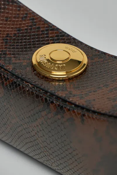 Jacquemus Ovalo Clutch In Brown