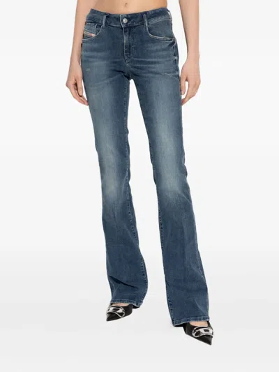 Diesel 1969 D-ebbey Distressed Jeans In Blue
