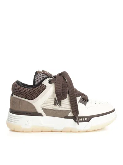 Amiri Brown Low Top Sneakers With Logo Detail On The Side And Mesh Panels In Brown