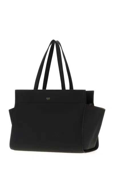 Khaite Pebbled Leather Zip Handbag In Black