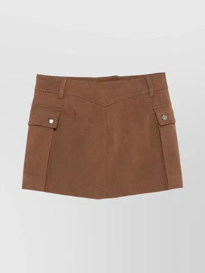 The Andamane Cargo Mini Skirt Featuring Front Pockets In Brown