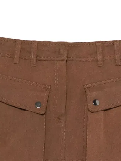 The Andamane Cargo Mini Skirt Featuring Front Pockets In Brown