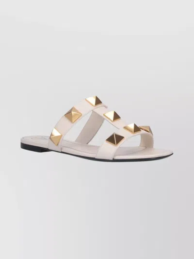 Valentino Garavani Roman Stud Flat Sandals With Signature Pyramid Studs In White