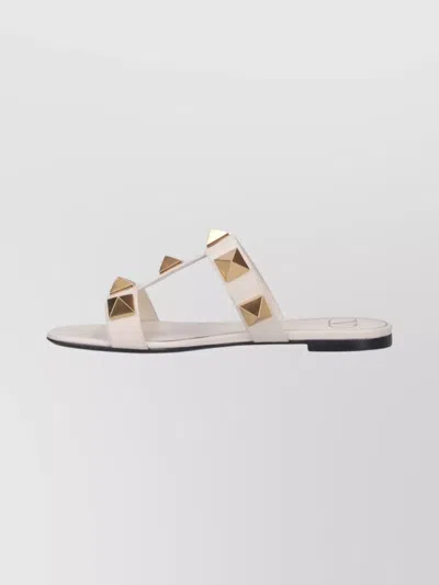 Valentino Garavani Roman Stud Flat Sandals With Signature Pyramid Studs In White