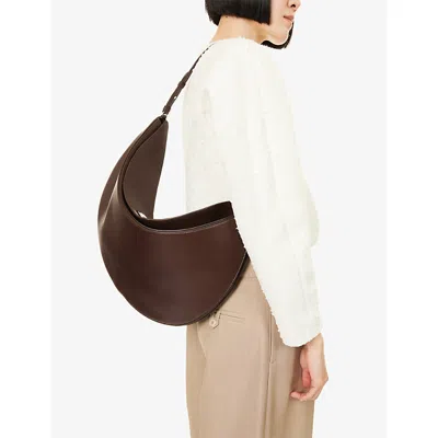 Jacquemus Le Calisso Rond Large Brown Shoulder Bag With Adjustable Strap And Embossed Logo In Leathe In Brown