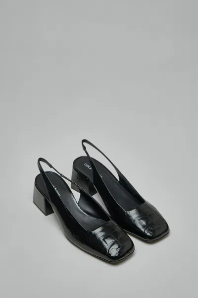 Courrèges Heritage Vinyl Slingbacks In Black