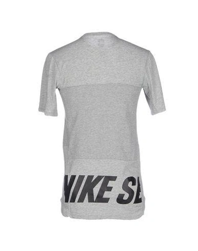 Shop Nike T-shirt In Grey