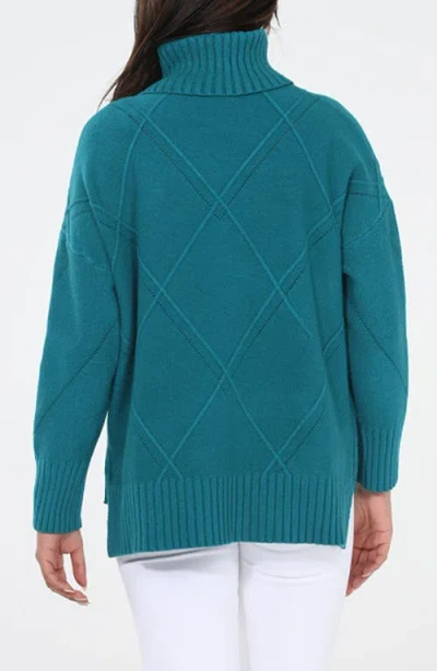 Rain And Rose Argyle Turtleneck Sweater In Blue
