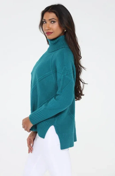 Rain And Rose Argyle Turtleneck Sweater In Blue