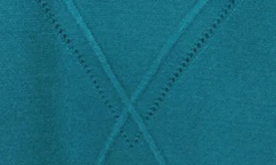 Rain And Rose Argyle Turtleneck Sweater In Blue