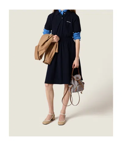 Miu Miu Canvas And Leather Backpack In Gray