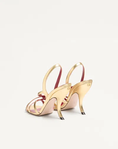 Valentino Garavani Fetishique Sandal In Laminated Nappa 105mm Woman Antique Brass 40 In Gold