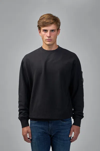 C.p. Company Minimalist Black Long-sleeve Crewneck Sweatshirt With Zippered Pocket In Black