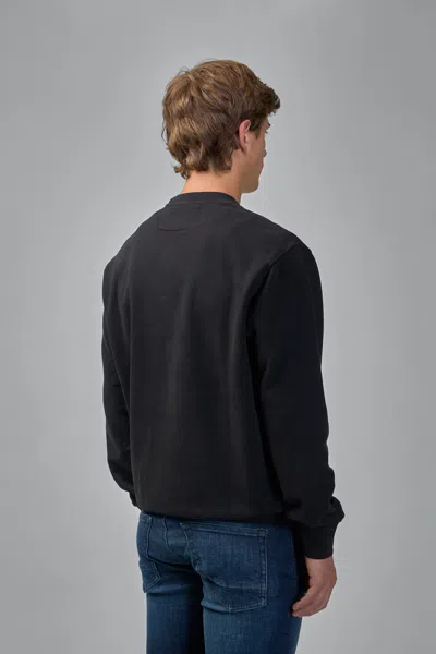 C.p. Company Minimalist Black Long-sleeve Crewneck Sweatshirt With Zippered Pocket In Black