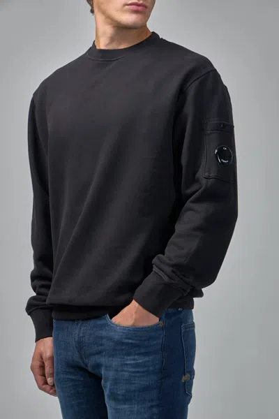 C.p. Company Minimalist Black Long-sleeve Crewneck Sweatshirt With Zippered Pocket In Black