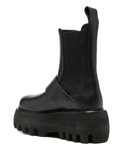 Alexander Mcqueen Ankle Boots With Buckle And Chunky Sole In Black