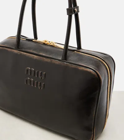 Miu Miu Black Bauletto Bag Zip Embossed Logo In Multi